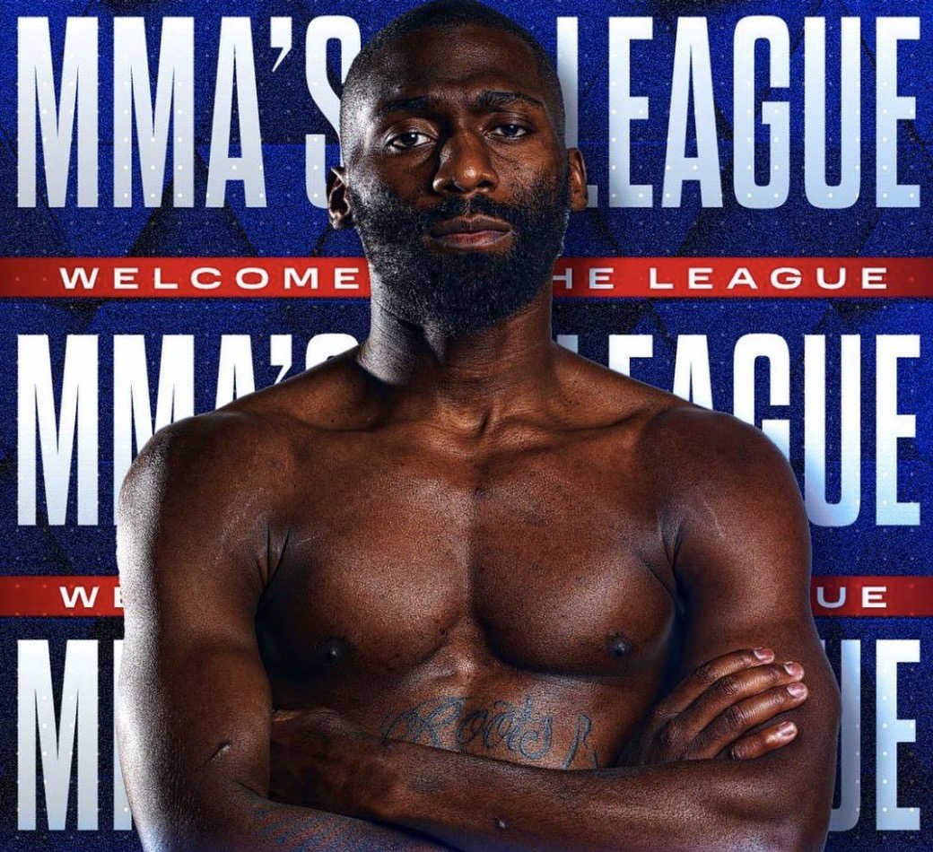 Cédric Doumbé bras croisé qui pose pour son affiche en MMA