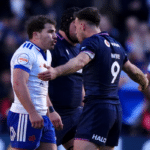 Antoine Dupont (left) and Scotland's Ben White