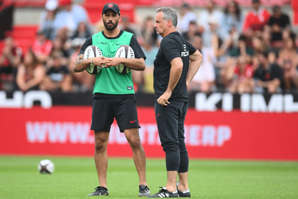Ugo Mola of Stade Toulousain and Clement Poitrenaud of Stade Toulousain