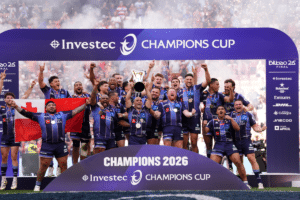 Union Bordeaux Begles' Maxime Lucu (centre) lifts the trophy with team-mates after the Investec Champions Cup final